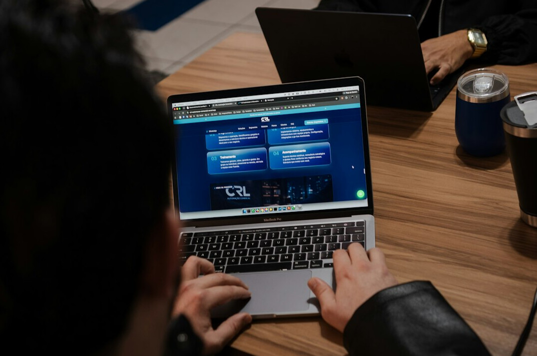 person learning coding on laptop