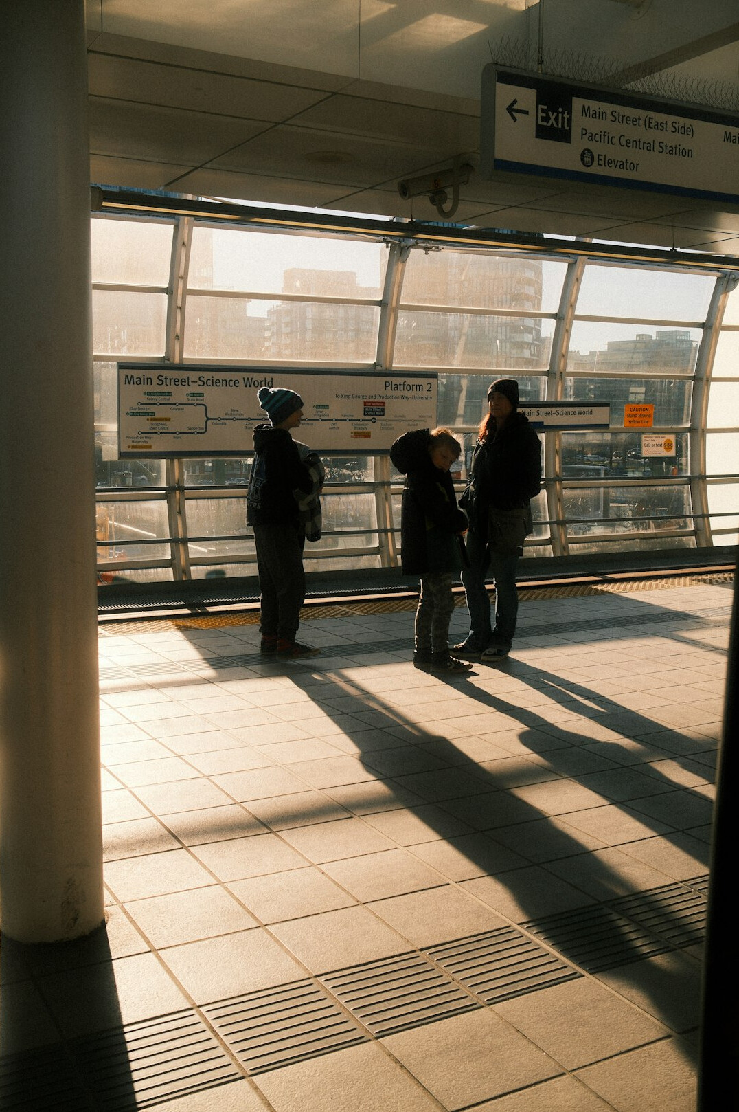 Group of Japanese people discussing in front of a whiteboard