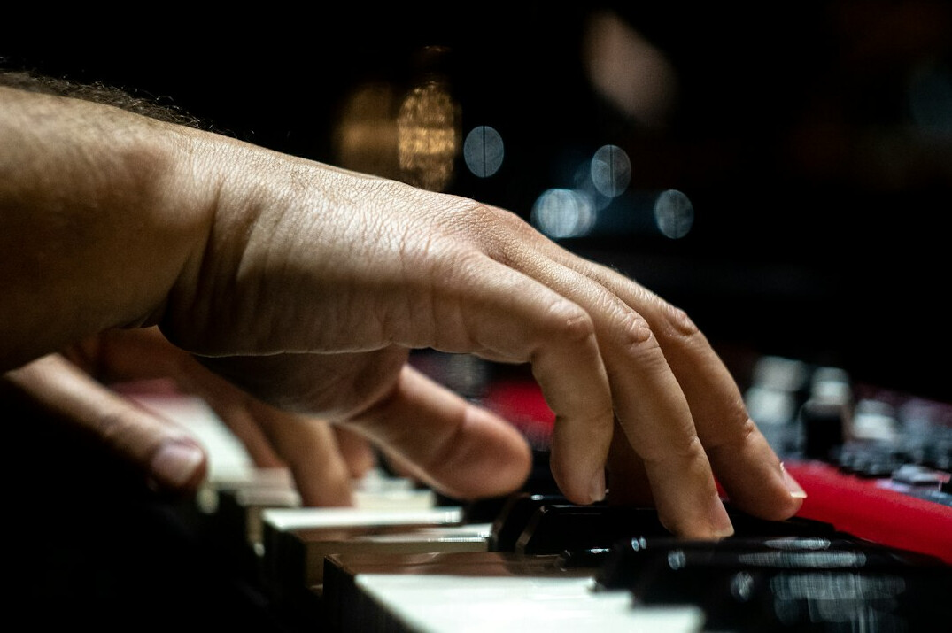 Close up of hands typing on a laptop keyboard