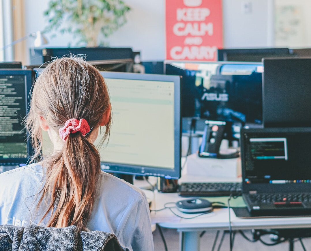 japanese student coding at desk