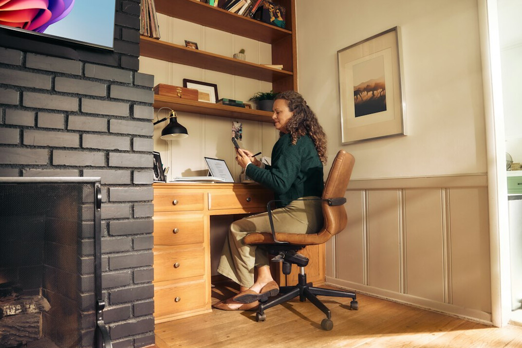 person studying at home desk