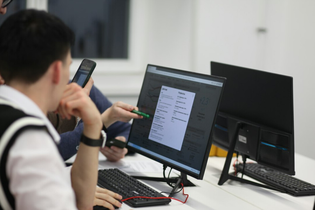japanese students coding in classroom